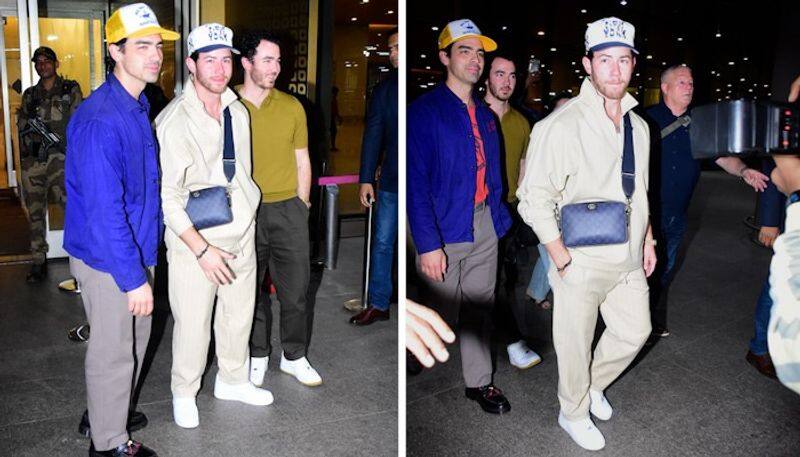 Photos Nick Jonas arrives in Mumbai with brothers Kevin, Joe Jonas to perform at Lollapalooza India RBA