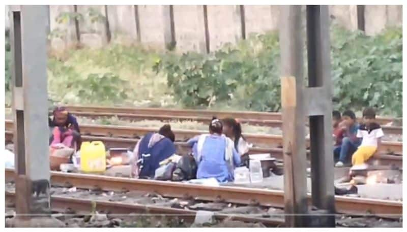 Video of women preparing food by in the middle of a railway track has gone viral bkg