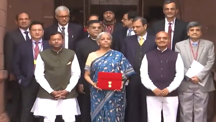 Interim Budget 2024 FM Nirmala Sitharaman dons blue saree poses with red tablet and team ahead of presentation gcw