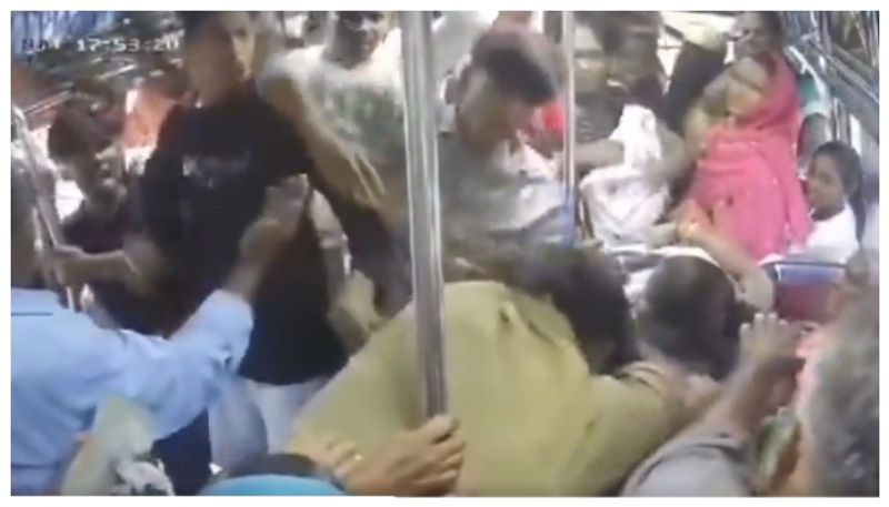 Video of passengers beating up conductor for he Abusing Woman Passenger In Tamil Nadu goes viral bkg