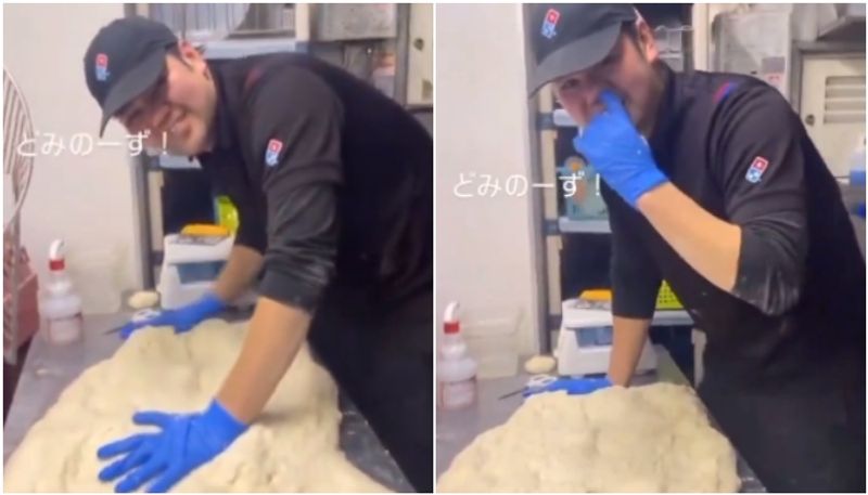 dominos employee touches pizza dough after picking nose the video going viral