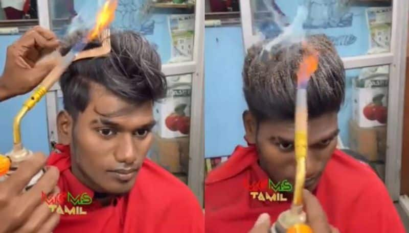 barber cutting hair with fire video rlp