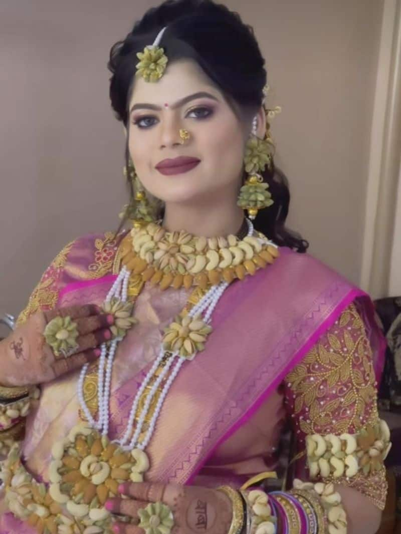 woman wearing dry fruit jewellery for baby shower zkamn