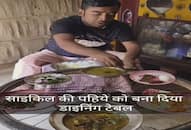 man used bicycle wheel as a dining table video goes viral zkamn