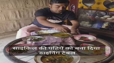 man used bicycle wheel as a dining table video goes viral zkamn