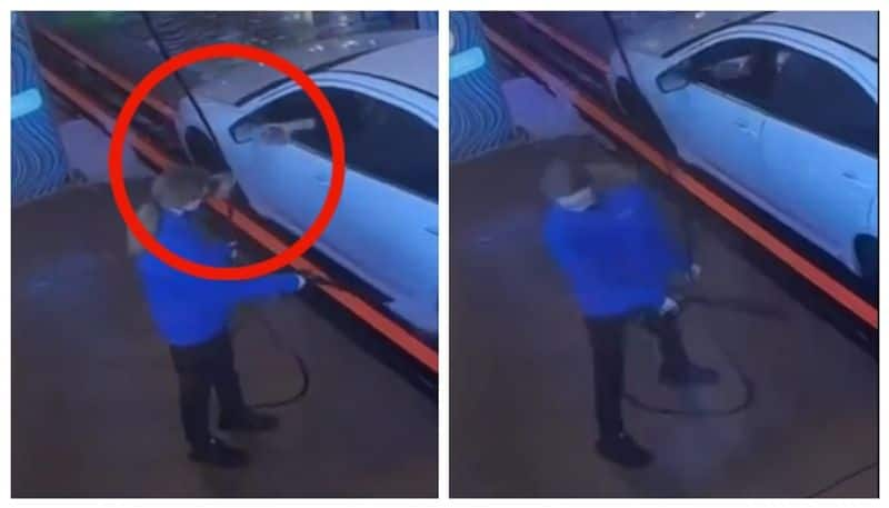 video of an car owner throwing water at a car washing employee goes viral bkg