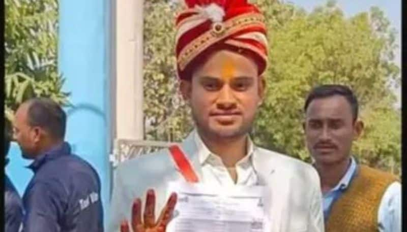 police constable exam candidate writes exam in grooms turban and henna filled hands as marriage placed on exam date etj