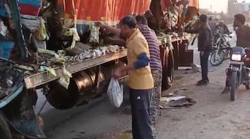 Highway havoc: Locals seize ghee packets after truck collision in Uttar Pradesh (WATCH)