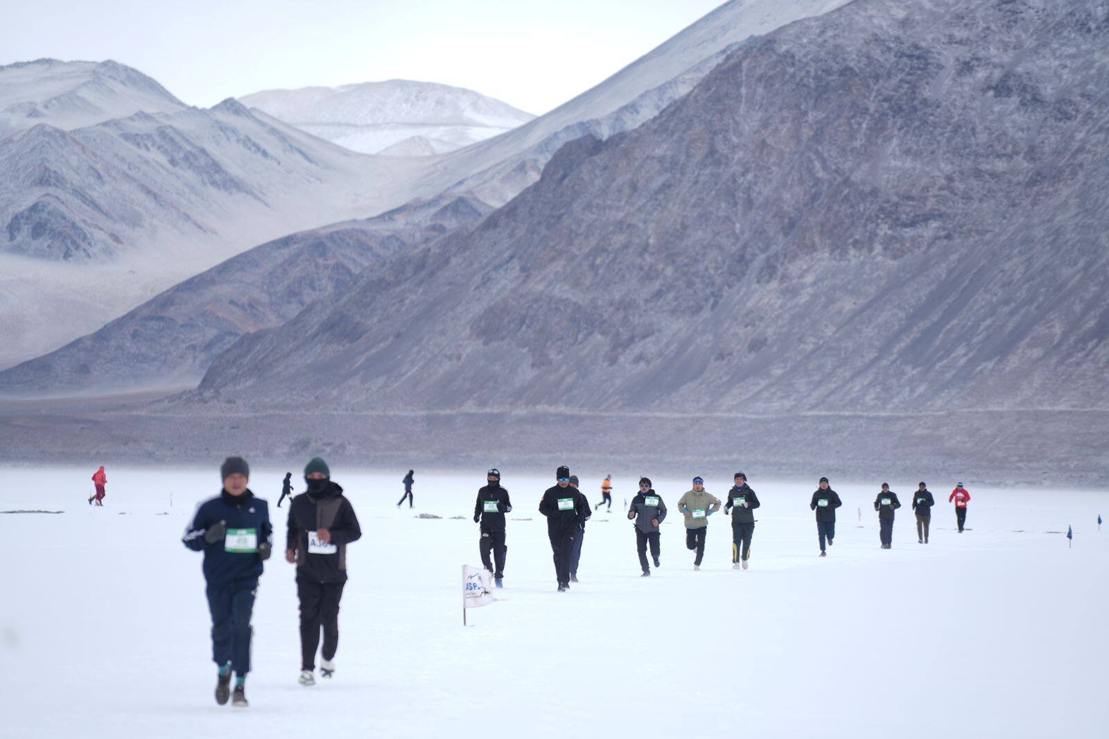 adventurous high altitude pangong frozen lake marathon photos kms