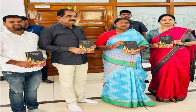 minister seethakka unveils dr surya dhananjays book ksp