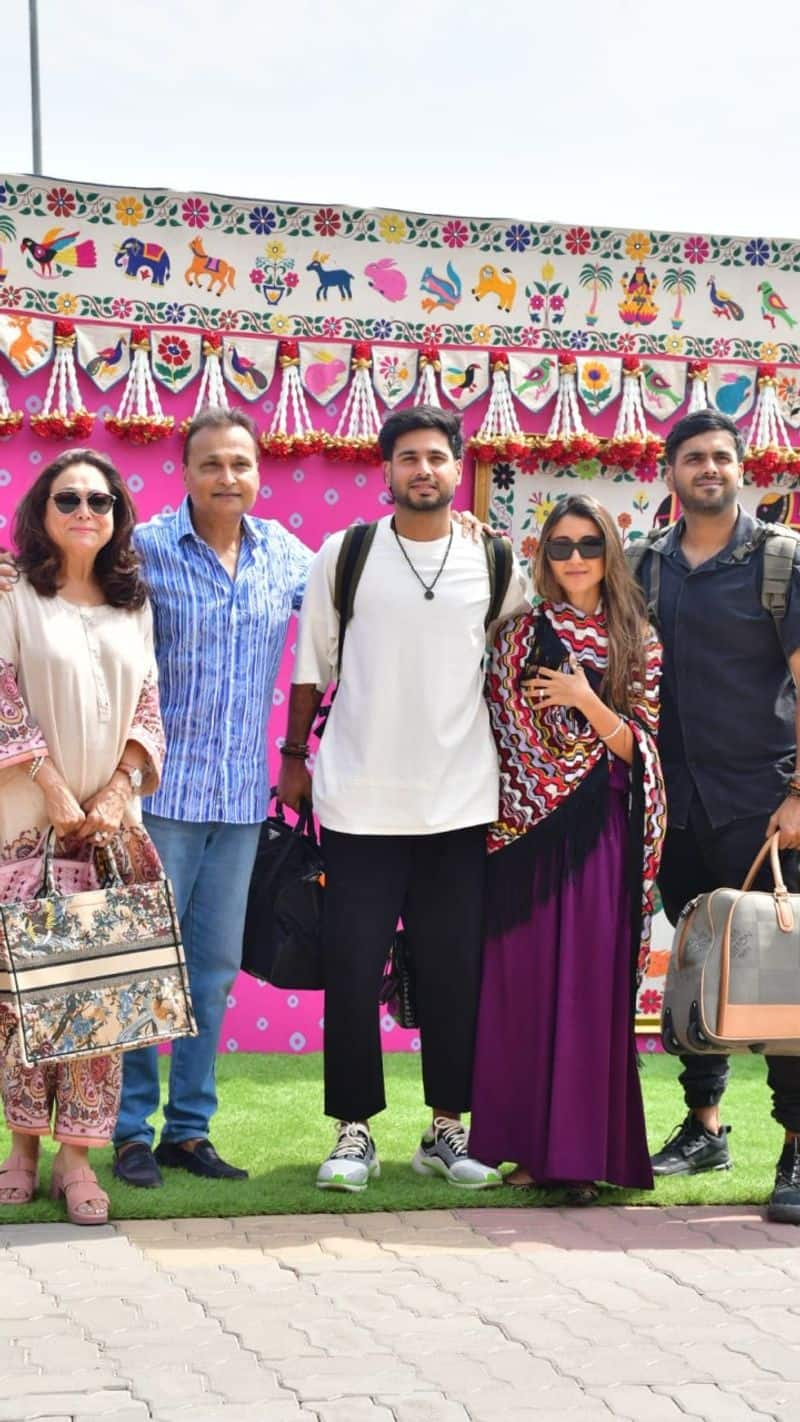 anil ambani tina ambani reached jamnagar with family anant ambani radhika merchant wedding photos kxa 