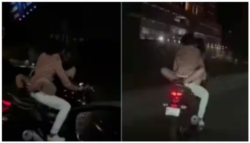 Lovers romance on a running motorcycle held by Ahmedabad Police 