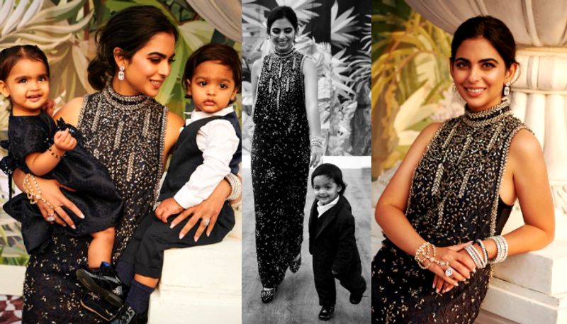 Isha Ambani poses with twins in Chanel's black gown at Anant's pre-wedding bash