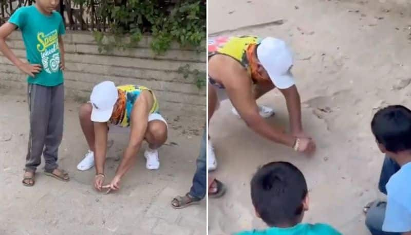 IPL 2024: Delhi Capitals' Rishabh Pant plays game of 'Goli' with neighbourhood kids; WATCH viral video snt