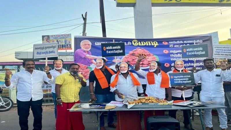 Coimbatore pollachi DMK campaign against pm modi as he is frying vadai with his mouth smp