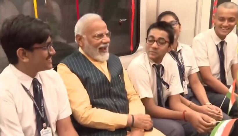 West Bengal: PM Modi commutes with school children on India's first underwater Metro train in Kolkata (WATCH)