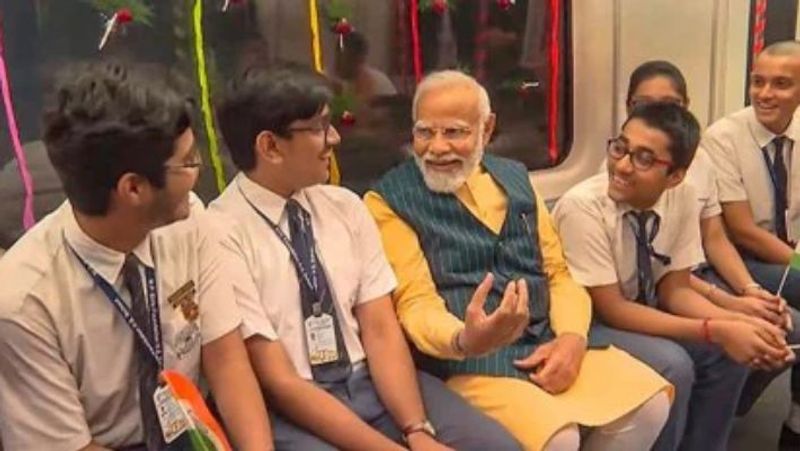 PM Modi rides the Kolkata Metro with schoolchildren through the country's first underwater tunnel-rag