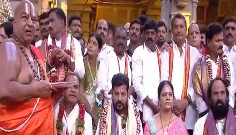 Telangana Chief Minister Anumula Revanth Reddy offers  holy clothes to Yadadri Lord Laxmi Narashima Swamy lns