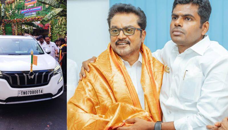 Actor and Politician Sarathkumar in white color car with BJP Flag in it ans