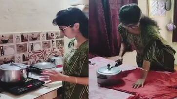 A unique video of women ironing clothes with a pressure cooker is going viral [Watch] nti