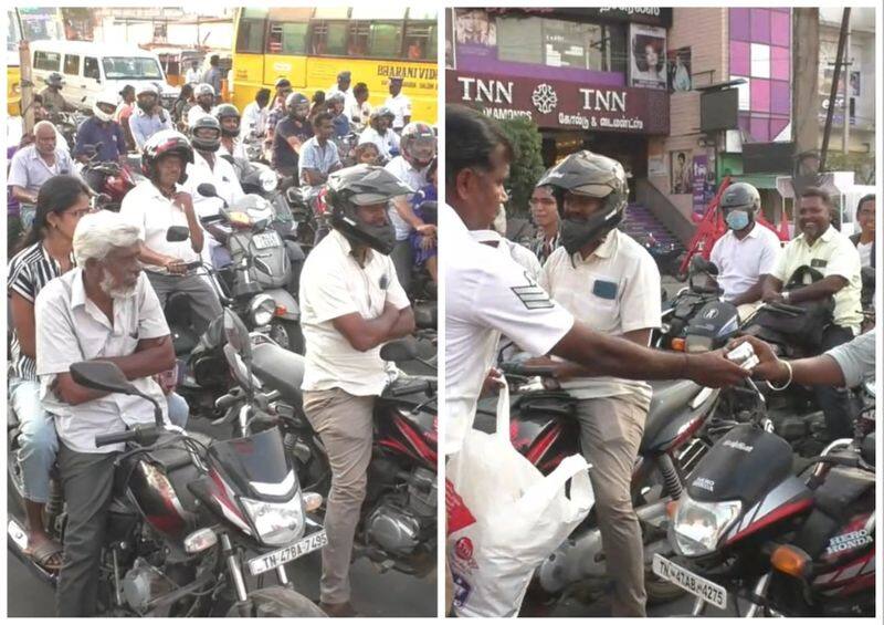 traffic police distribute free tiffin box who wear helmet in karur district vel