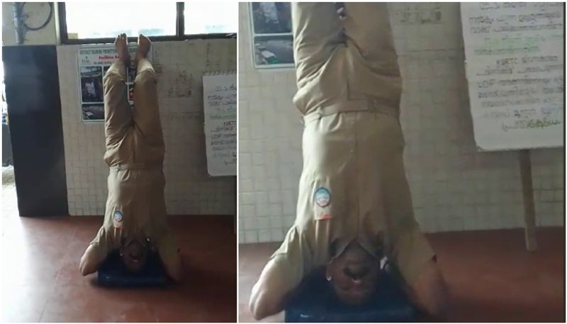 Kerala: KSRTC driver stage protest by standing upside down due to delay in salary anr