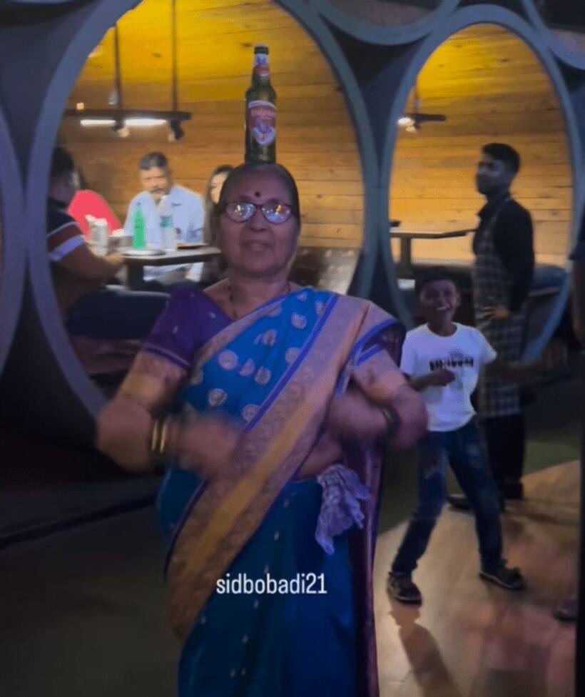 Video: Elderly lady dances with joy at bar, steals hearts with beer bottle dance resembling Jamal Kudu (WATCH)