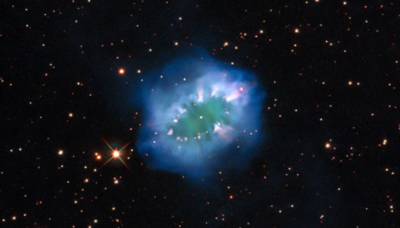 NASA hubble released a pic of cosmic jewelry 15000 light years away from earth ans