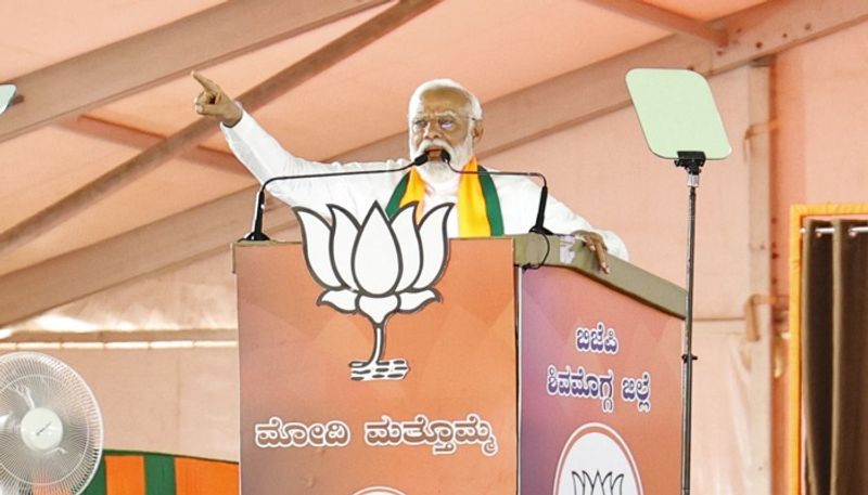 PM Narendra Modi slams Karnataka Congress grg 