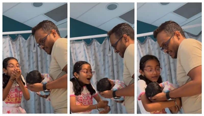 viral video of 10 years old sister seeing her newborn brother in first time