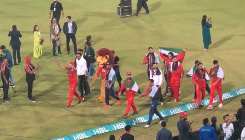 Islamabad United players waves Palestine flags in victory march after PSL 2024 win