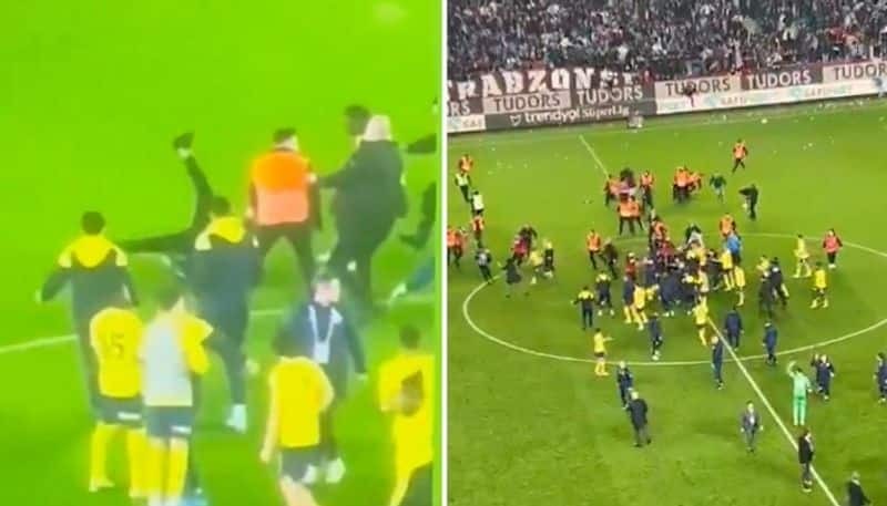 Football Turkish Super Lig: Violence erupts between Trabzonspor fans and Fenerbahce players (WATCH) osf