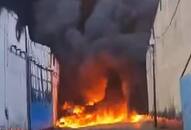 Delhi Fire News Fire havoc before Holi A massive fire broke out in a factory in Alipur Fire brigade team busy in extinguishing XSMN