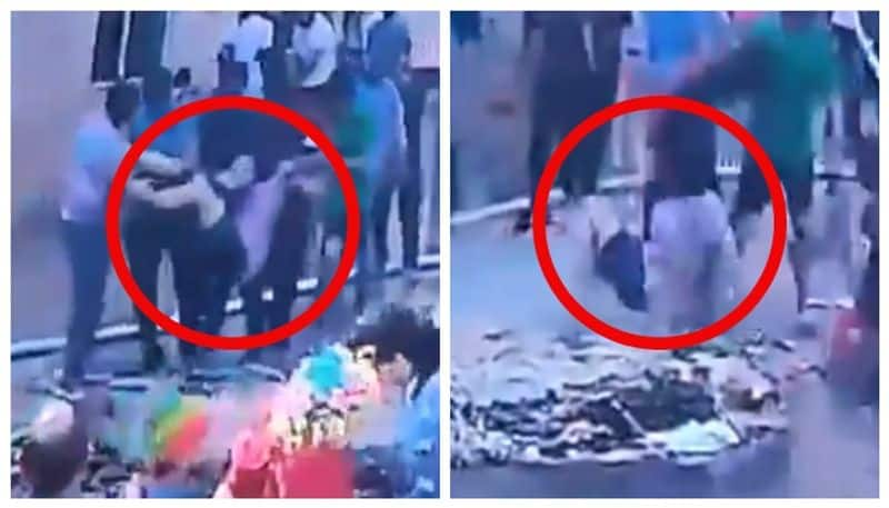 Video of boy being thrown into the ashes of Holika Dahana goes viral bkg