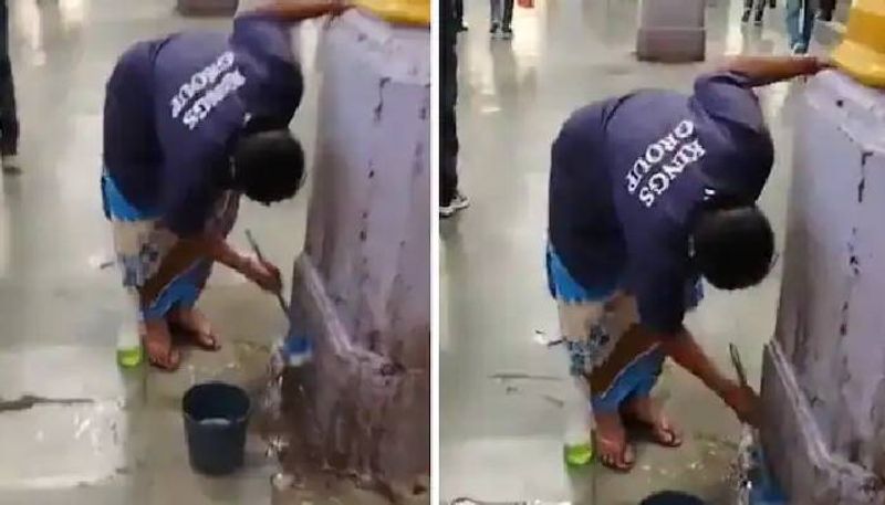 worker struggling to clean spit stains video rlp