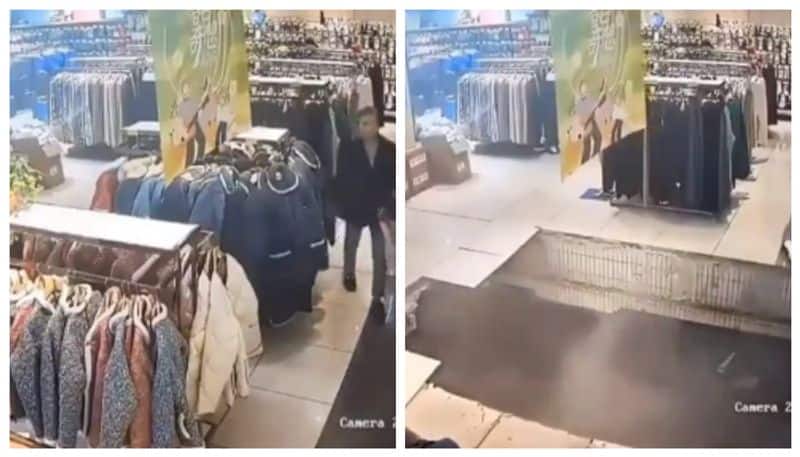 floor of a shopping mall collapsed while the woman was choosing clothes CCTV footage goes viral bkg