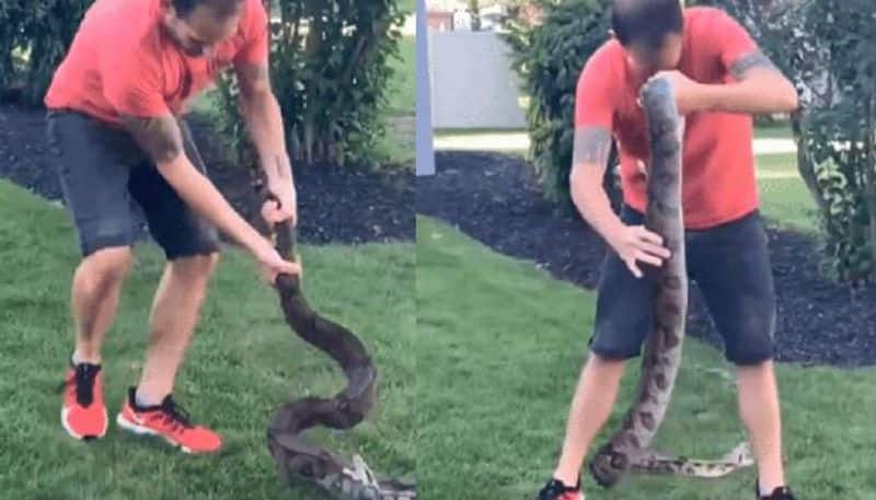 man messing with snake then bite him rlp