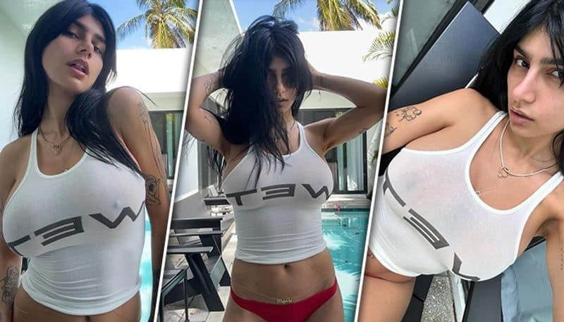 Mia Khalifa SEXY photos: OnlyFans model goes braless in white tanktop and red bikini bottom; check out pics RBA