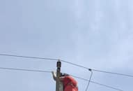 Viral video: Woman climbs electric pole in Gorakhpur amidst ruckus over illicit affair (WATCH)