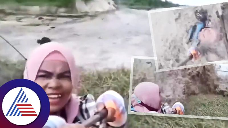 Woman takes selfie with tsunami waves and video goes viral sum