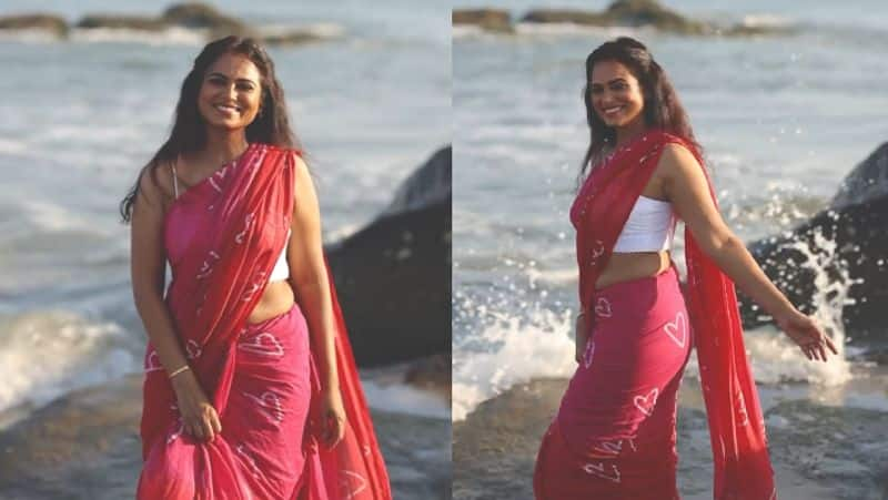 Ramya Pandian beachside photoshoot in beautiful red saree viral photos gan