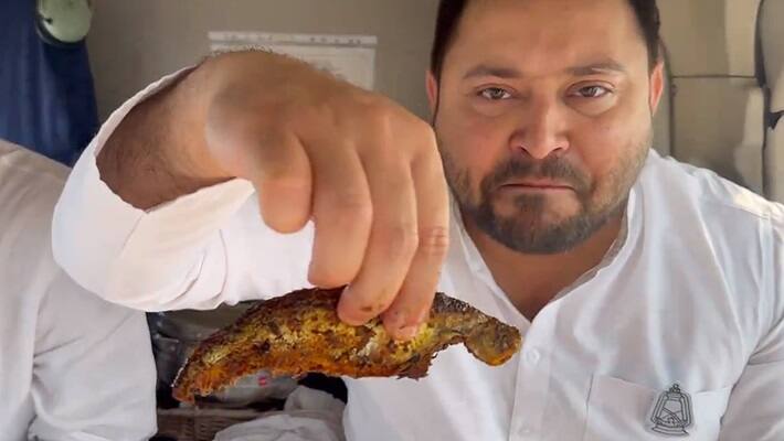 Tejashwi Yadav eats fish in helicopter