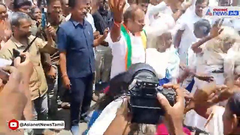 bjp candidate l murugan did traditional dance with people in nilgiris vel