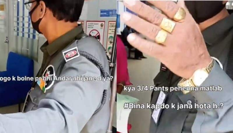 man wearing shorts denied entry in bank video 