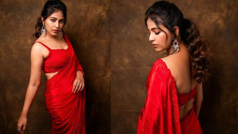 Actress Anjali wishes Tamil New Year with a red hot saree photos gan