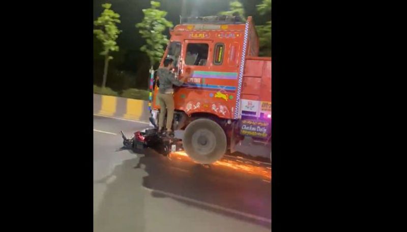 Viral Video Shows Man Standing On Speeding Truck Footboard Inner Ring Road Hyderabad KRJ