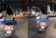 Bengaluru couple rides scooter with child standing footrest, Internet puzzled; WATCH viral videortm