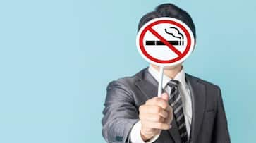 What is the UK smoking ban, how will it be implemented, and when will it go into effect? nti