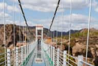 Which is the longest glass sky over bridge in the country Chitrakoot or Kerala? XSMN