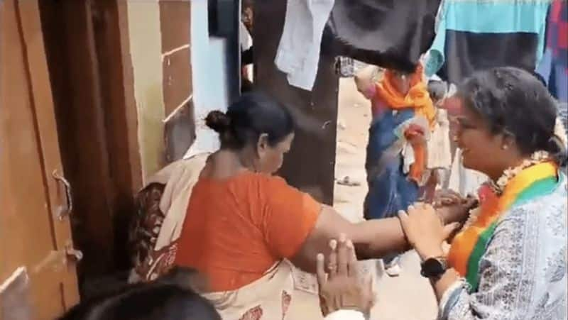 Hyderabad woman pushing away BJP sandidate Madhavi Latha during campaign video goes viral smp